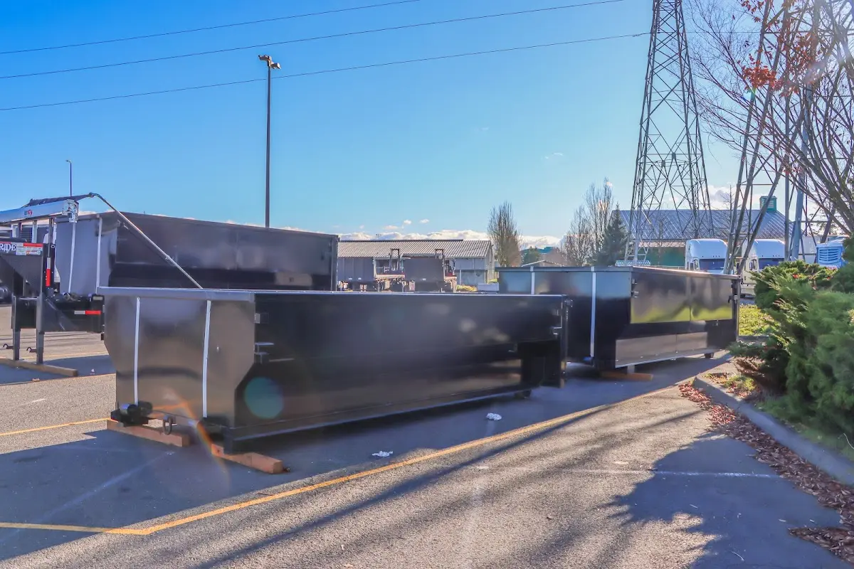 Roll-off dumpster ready for waste disposal at job site for 6 Yard Dumpster Rental in Tomah
